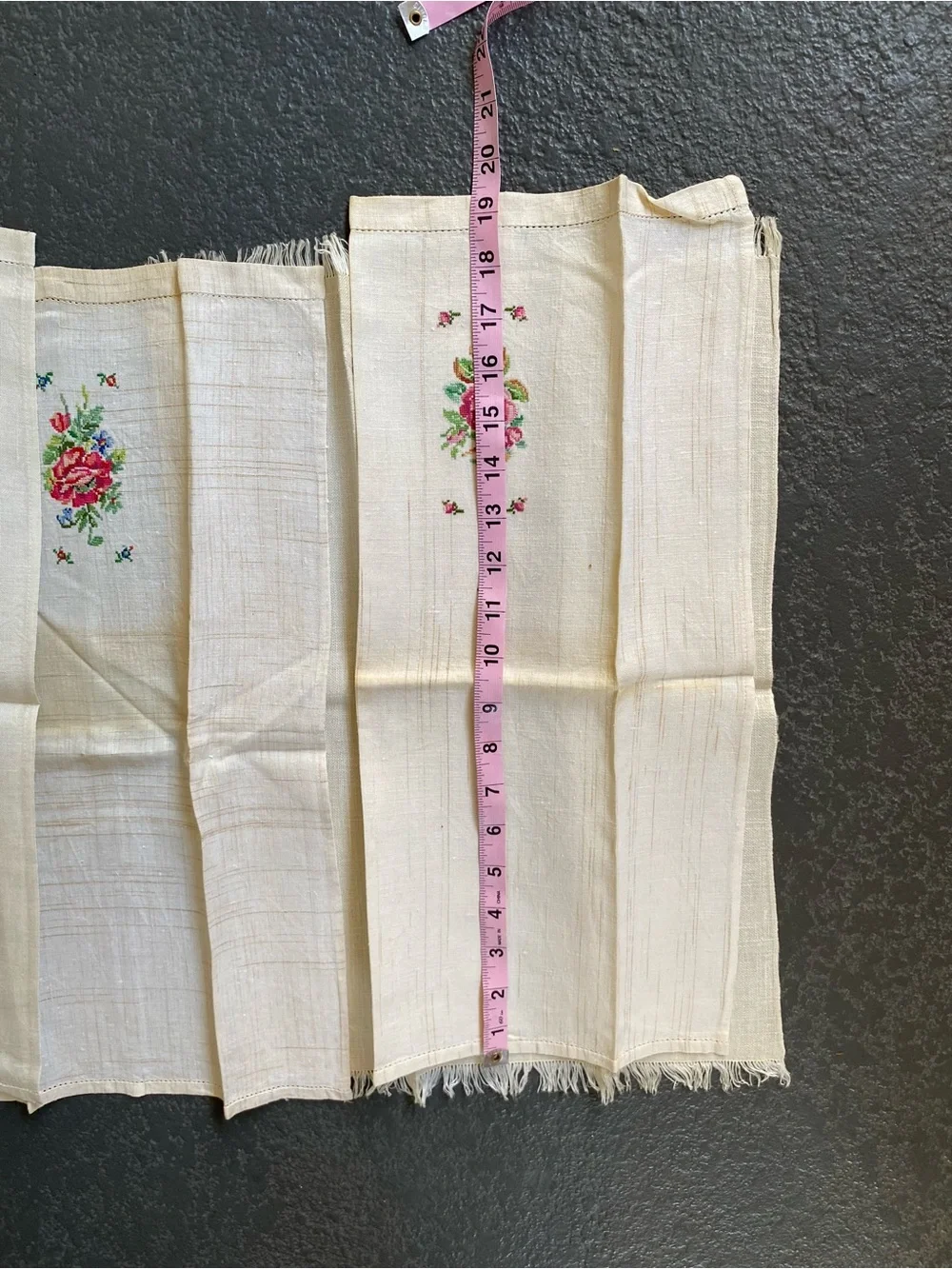 The image shows a set of four vintage hand-embroidered and cross-stitched